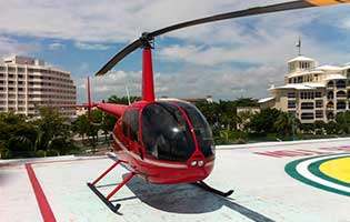 Tours en helicoptero en cancun Renta de Helicoptero R44 isla HOLBOX sobre ISla Mujeres privado charter tour aereo de lujo