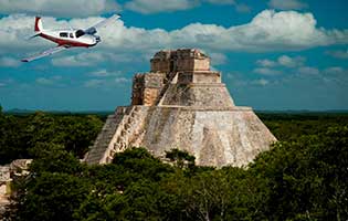 Tours en helicoptero en cancun Tour aereo uxmal maya ISla Mujeres privado charter tour aereo de lujo