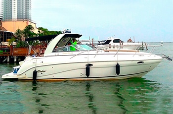 Tours en helicoptero en cancun, tours en yate privado, renta de yates de lujo, yates para charter en cancun, isla mujeres, puerto morelos, puerto cancun, uniesse rinker de 33 pies